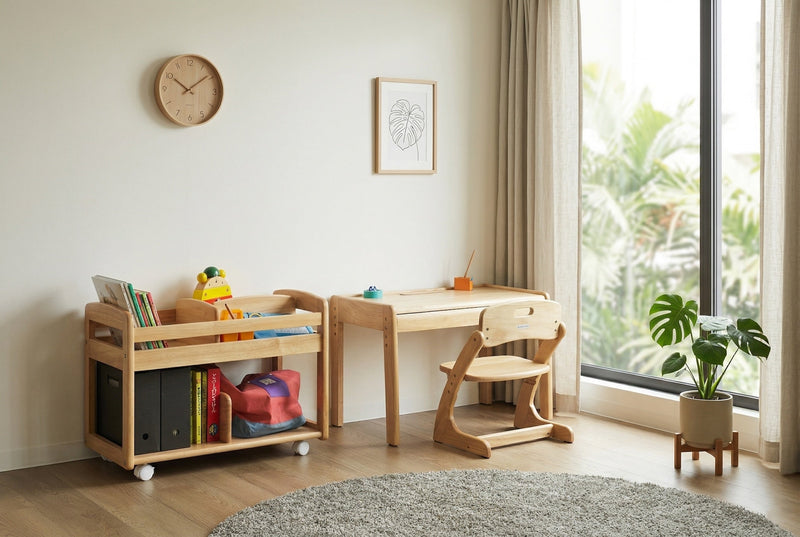 Buono 3 Kids Desk and Chair with rubberwood bookshelf in a compact apartment with warm natural light and oak flooring