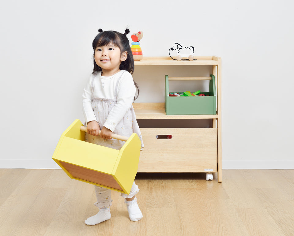 The two detachable storage bins removed from the Yamatoya Norsta3Kids Toy Rack frame, showing how children can carry them independently.