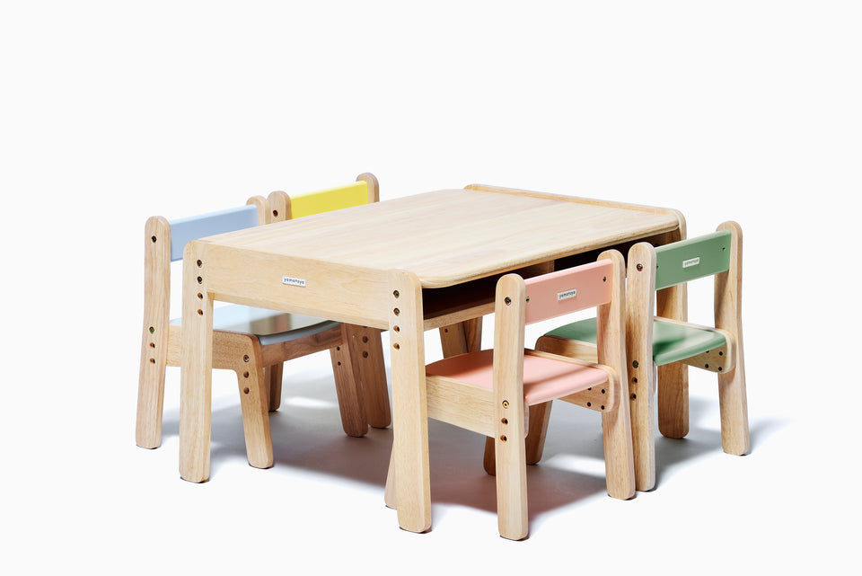 Four children seated at the Yamatoya Norsta3 Kids Table with Norsta3 Kids Chairs, showing the 84 cm wide table in use.